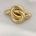 Elegant gold twisted knot metal spring hair clip with a high-polish mirror finish - Knotted Design Gold