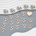 Detailed macro view of colorful heart-shaped enamel charms for DIY jewelry making - Style YJ13-07