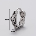 Macro detail of vintage silver skull earring showing 1.5cm height and 0.5cm width dimensions - Skull Relief Style (S41)