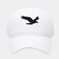 Close-up of black eagle embroidery on a white washed cotton baseball cap, soft crown - Adjustable / White