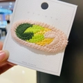 Handmade crochet oval hair clip with colorful wavy pattern on white display card - 12# Green Oval Slice