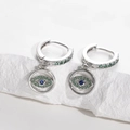 Silver evil eye hoop earrings with blue center stone and sparkling green zircon accents - Silver-Green Zirconia