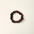 Elegant brown satin silk hair scrunchie shown from a top-down view on white background - Small Coffee
