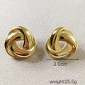 Detailed view of polished golden twisted triangle earrings with 3.0cm diameter and weight stats - Gold