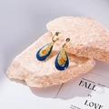 Vintage gold-plated teardrop earrings with blue enamel and orange gemstone on pink rocks - Blue and Orange Vintage Drop Style (EH003)
