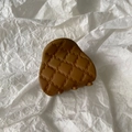 Macro detail of brown matte hair claw clip featuring a classic quilted pattern texture - Small / Light Coffee