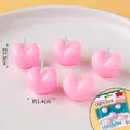 Five small pink apple-shaped birthday candles in a white ceramic dish, 5pcs pack - Small Cherry Pink Candles 5 Pcs