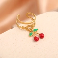 Detailed close-up of a double-layered gold stainless steel ring with a red cherry pendant - Double-layer Engraved Style (J-20013)