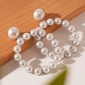 Exaggerated geometric round hoop earrings with elegant white faux pearls for women - Silver Pearl Style