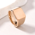Macro view of polished rose gold square signet ring with a minimalist smooth finish - US 6 / Large Plaid / Rose Gold