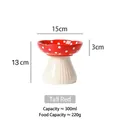 Red mushroom ceramic elevated cat bowl with white spots and tilted neck protection - Elevated Red Mushroom Bowl