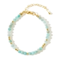 Detail of faceted light blue beads with gold spacers and lobster clasp on a beaded bracelet - Light Blue