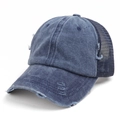Detail of distressed dark blue washed cotton baseball cap with breathable mesh and ripped brim - Adjustable / Navy Blue