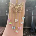 Golden butterfly suncatcher pendant with multi-colored charms and tassels for garden decor - Gold Butterfly Star
