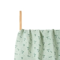 Soft cotton baby swaddle blanket with light green floral print on a wooden hanger - Fresh Green Floral (S144)