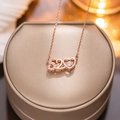 Roségouden roestvrijstalen 520 hartketting met fonkelende kristallen aan een fijne ketting - Roségoud