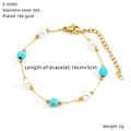 Detail of 18K gold plated stainless steel bracelet with pearls and blue glass beads - Gold White Blue Pearl Style (S-H560)