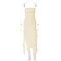 Detail of ruched beige tube dress with asymmetric ruffled hem on mannequin - Apricot