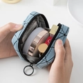 Mini light blue PU leather cosmetic bag with geometric lines and black zipper detail - Leather Blue