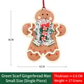 Gingerbread man Christmas ornament with green scarf, measures 8x6cm for tree decor - Small Gingerbread Man with Green Scarf