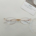 Elegant gold oval metal glasses frame with sparkling rhinestones for a vintage luxury look - Gold Frame White Lens