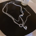 Collana a doppio strato argento con catena cubana e ciondolo a cuore a scacchi bianco nero - Catena Cubana a Strati con Cuore a Scacchiera Argento