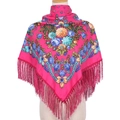 Detail of pink ethnic floral scarf showing vibrant patterns and long fringe tassels - Rose Red