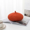 Classic orange wool beret hat with structured shape on a minimalist magazine background - One Size / Orange Red