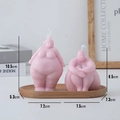Pink handmade torso shaped candles in standing and sitting poses with size measurements - Sitting Posture / Pink