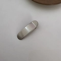 Minimalist silver metal hair clip with matte finish for women and girls on white desk - Chubby Bar Clip