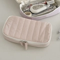 Macro detail of a pink quilted large capacity pencil case with vertical stripes - Pink
