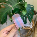 Pink and blue gradient translucent resin hair claw clip held in hand for high ponytail - Dazzling Blue Pink