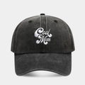 Close-up of Cool Mom embroidery on a washed charcoal grey cotton baseball cap - Cool Mom Embroidery / Cool Mom Black