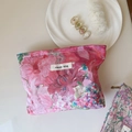 Close-up of pink floral liberty print canvas makeup bag with a simple wish woven label - Rose Pink Large Floral