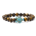 Tiger eye beaded bracelet featuring a turquoise sea turtle charm on a white background - Yellow Tiger Eye