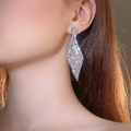 Elegant silver long tassel drop earrings with sparkling rhinestones in a geometric design - Silver Pave Geometric Rhombus Long Tassel Earrings DTE1616786S