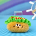 Close-up of a cute furry croissant-shaped plush pendant with large embroidered eyes. - Hot Dog / 8x10cm