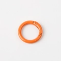 Detailed view of an orange round metal spring ring buckle for keychains and accessories - Orange (Outer Diameter 23mm)