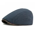 Navy blue beret cap for men featuring a brown leather-textured brim and minimalist style - Adjustable / Navy Blue