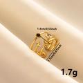 Detail view of 18k gold astronomical ring with size specs on white satin fabric - Multi-layer Celestial / Gold Black