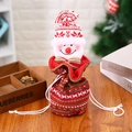 Knitted Christmas drawstring candy bag with a 3D snowman character and festive patterns - Knitted Snowman Bag
