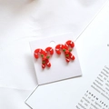 Christmas candy cane stud earrings with red and white stripes and green holly leaf detail - Red Candy Cane