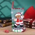 Detail of Christmas stocking with 3D plush bear and red buffalo plaid linen texture - Large Dancing Sock Bear