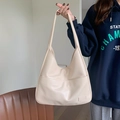 Minimalist beige PU leather tote bag with functional front pocket for daily commute - White