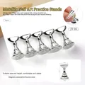 Macro detail of silver magnetic nail art stands with dimensions 1.4x2.4cm and metal finish - Japanese Nail Practice Pad 05