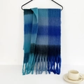 Detailed view of mohair plaid scarf with blue gradient patterns and soft fringe tassels - 210cmx40cm / Deep Sea Blue