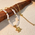 Set di collana dorata e perle finte con un elegante ciondolo a forma di tartaruga marina - Stile Ciondolo Tartaruga (XL-YS218-4)