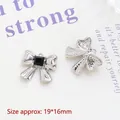 Detailed macro view showing silver bow pendant dimensions 19x16mm with black gemstone - 4# Small Bow Black Rhinestone