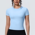 T-shirt da yoga blu chiaro aderente a maniche corte da donna in vista studio professionale - S / Blu Mulino