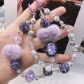Handmade Nepal style phone chain with purple crystal beads, faux gems and floral charms - Purple Flower